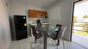 Comfort Apartment, Kitchen, Tower | Dining room - Residencia Gran Coyula Orange 508B (Tonala)