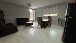 Basic Apartment, Multiple Beds, Kitchenette, Tower | Living area - Residencia Gran Coyula Orange 512B (Tonala)