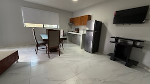Basic Apartment, Multiple Beds, Kitchenette, Tower | Dining room - Residencia Gran Coyula Orange 512B (Tonala)