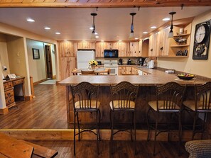 Fridge, microwave, oven, stovetop - Secluded Glacier Meadow Log Home - 4 bedrooms, 2 bathrooms (Essex)