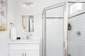 Shower, hair dryer, shampoo