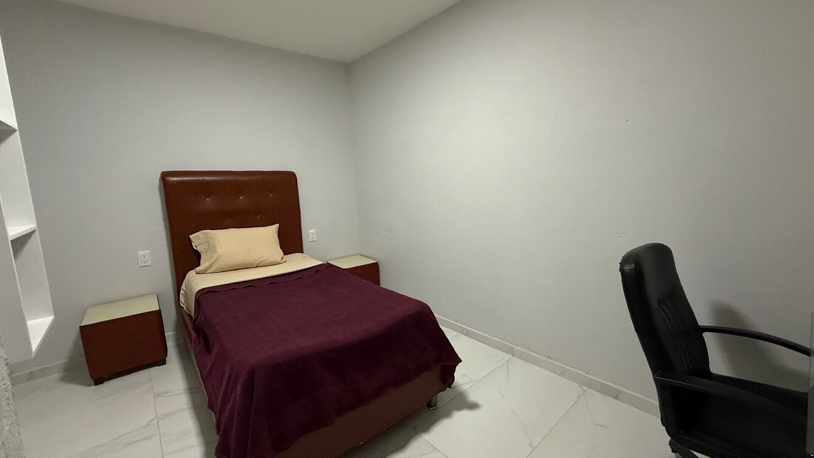 Basic Apartment, Patio | Blackout drapes, iron/ironing board, free WiFi