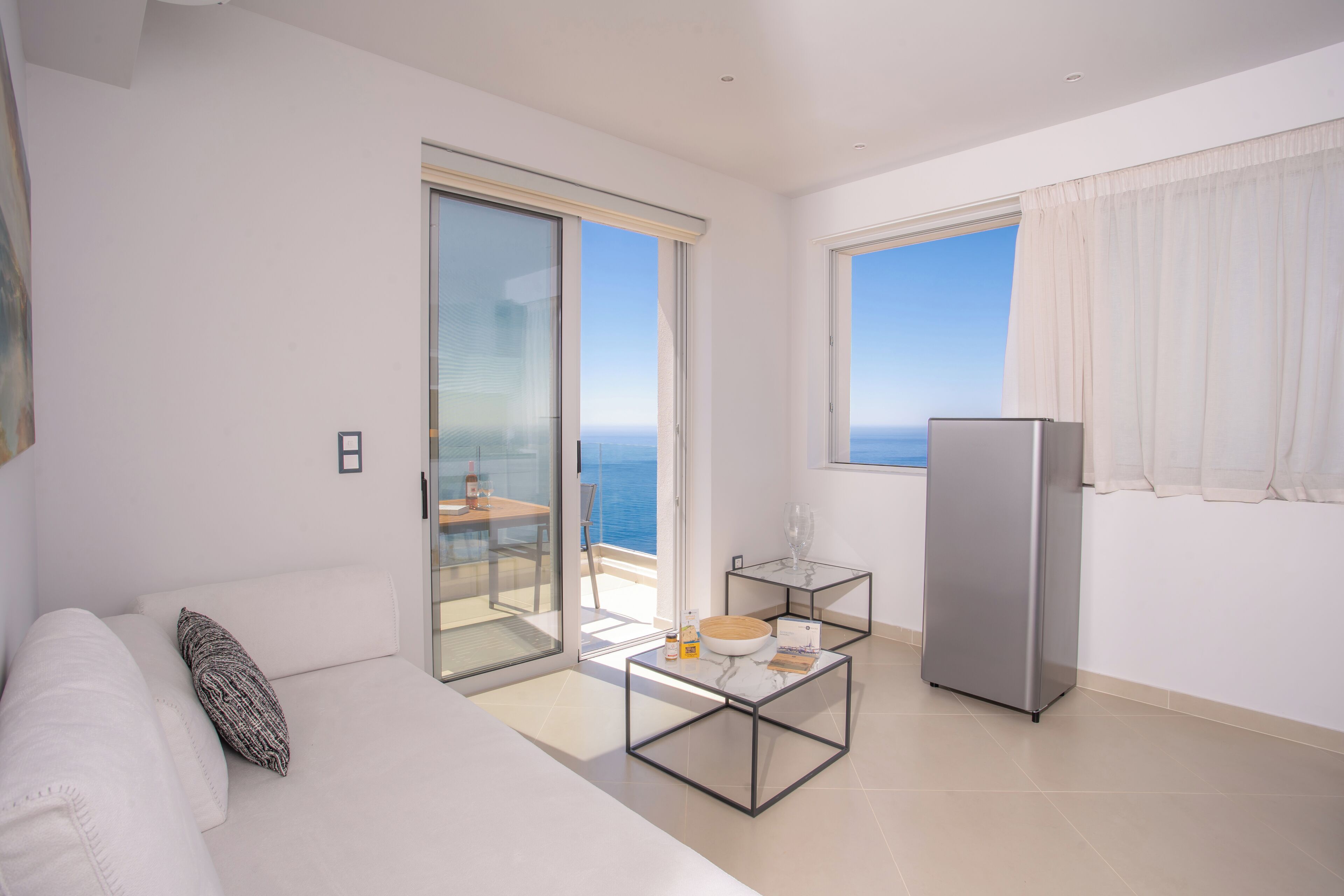 Suite, balcony,pool/sea view | Living area | 45-inch Smart TV with satellite channels, Netflix, streaming services