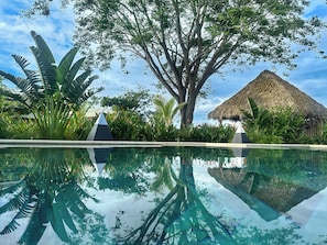 Outdoor pool, open 6:00 AM to 9:00 PM, sun loungers