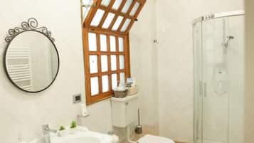 Luxury Room | Bathroom | Shower, hair dryer, towels, soap