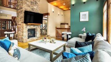 Smart TV, chimenea, videojuegos y futbolito