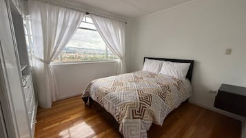 Family House, Balcony, Garden View | Blackout drapes, iron/ironing board, free WiFi