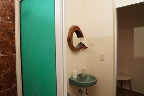 Shower, towels, soap, toilet paper