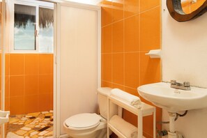 Shower, towels, soap, toilet paper