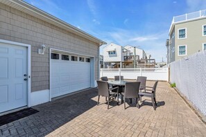 Outdoor dining - Walk to Beach/Boardwalk/Bay • 4BR • Garage Lounge • Patio • 3‑Car Parking (Seaside Heights)