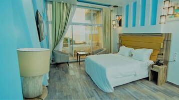Deluxe Double Room, Balcony, Sea View | In-room safe, desk, laptop workspace, blackout curtains
