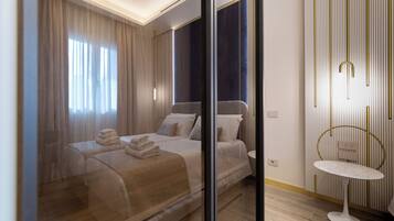 Chambre, salle de bains privée, vue ville