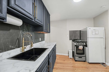 Fridge, microwave, oven, stovetop. Cozy Hazel Park 2BR retreat w/free parking near top attractions