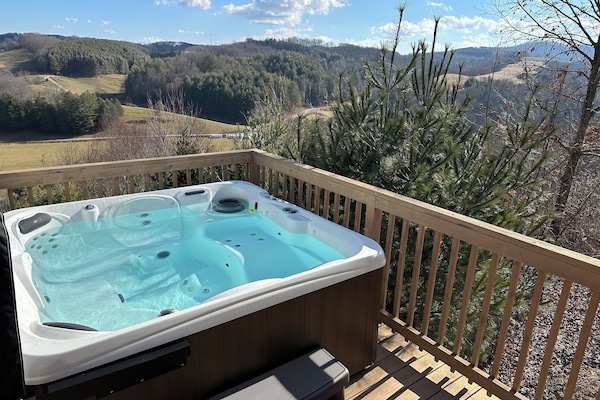 Bañera de hidromasaje al aire libre