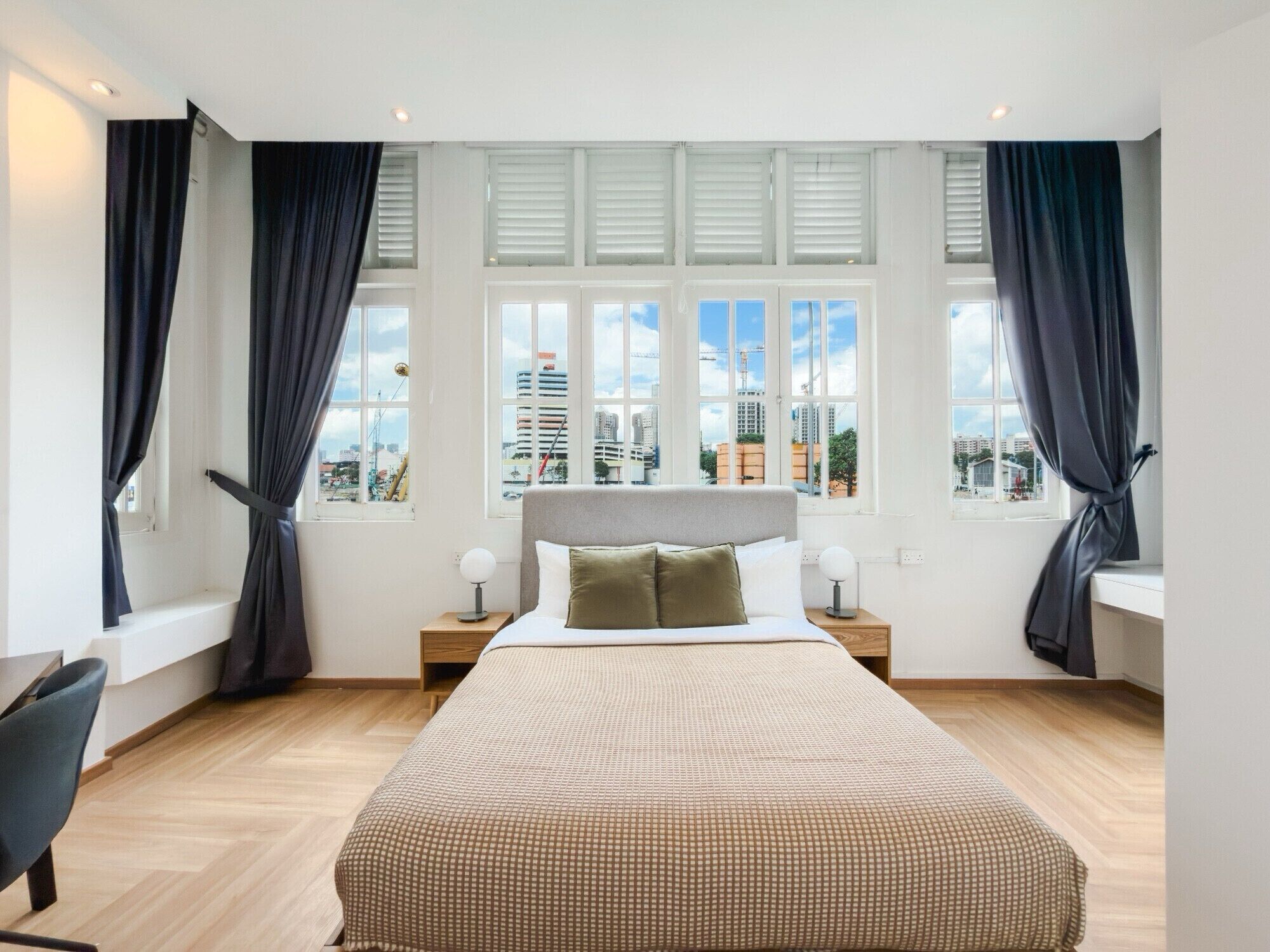 Desk, laptop workspace, blackout curtains, iron/ironing board