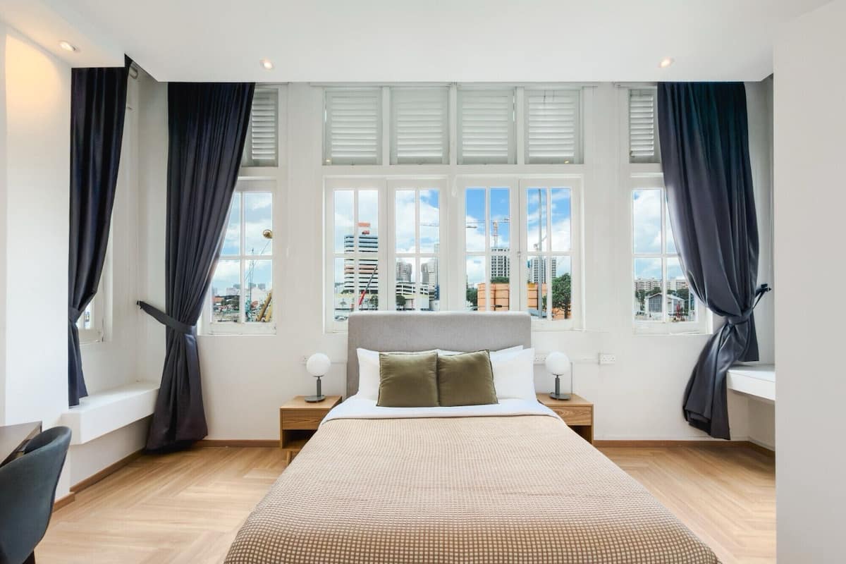 Desk, laptop workspace, blackout curtains, iron/ironing board