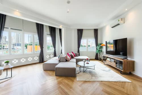 Family Apartment, 3 Bedrooms, Balcony, City View | Living area | 48-inch Smart TV with digital channels