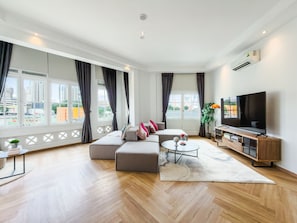 Family Apartment, 3 Bedrooms, Balcony, City View | Living area | 48-inch Smart TV with digital channels - The White House Serviced Residences (Singapore)