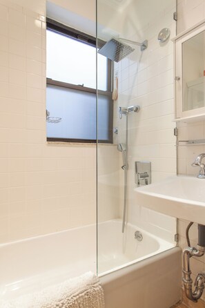 Shower, hair dryer, towels, soap