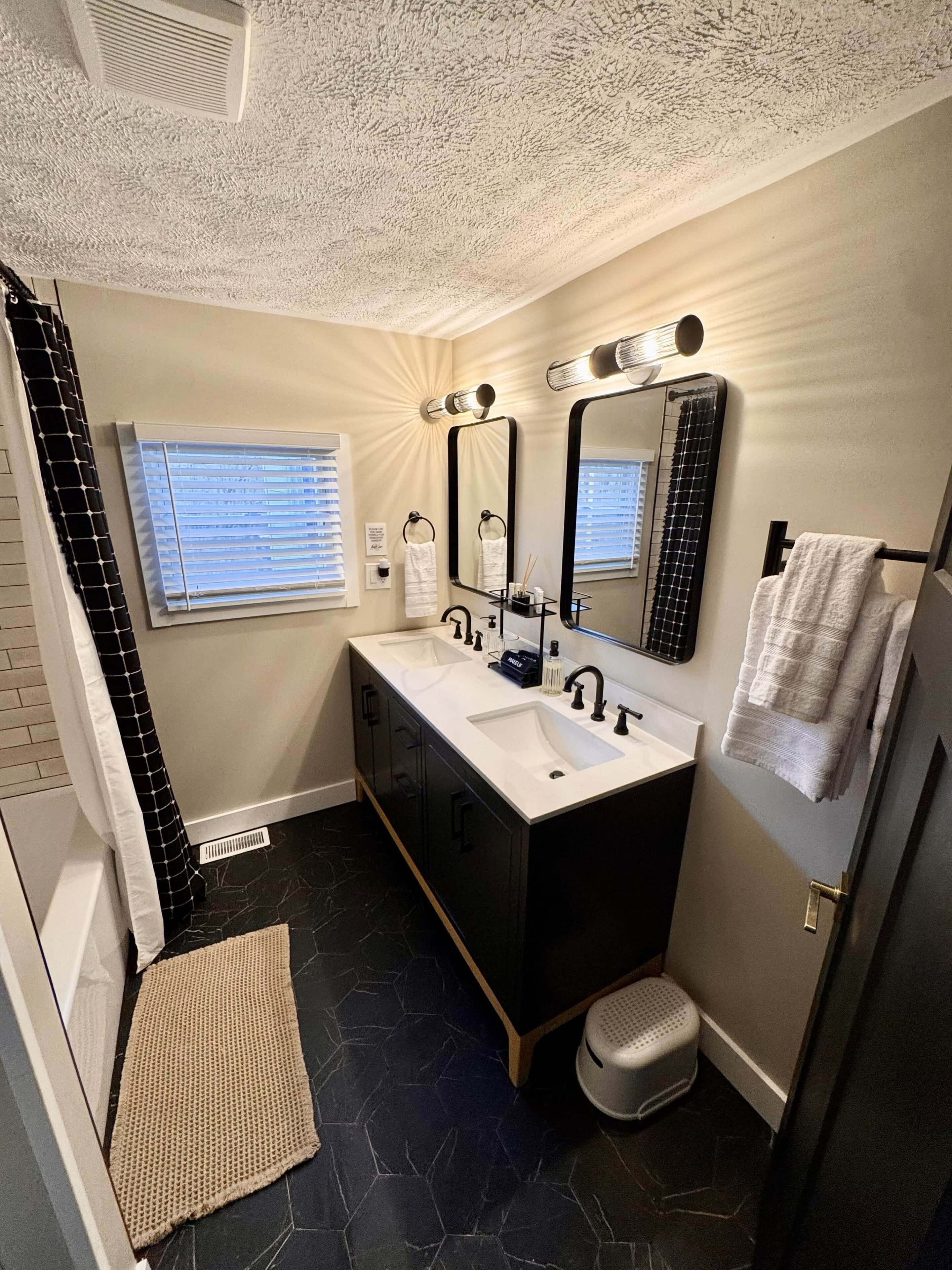 Shower, hair dryer, soap, toilet paper