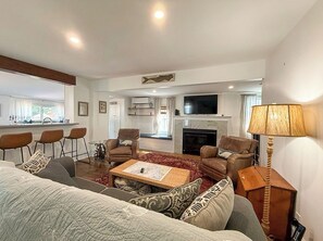 TV, fireplace - Shell Yeah! Cape Charles Family-Friendly Retreat Walkable to Town & Beach (Cape Charles)