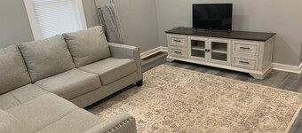 3-bedroom cozy apartment in quaint New York Mills with AC, washer and dryer.