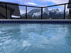 Pool - Mountain Views Lux 2BR Condo in Canmore w/ Hot Tub (Canmore)