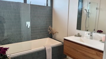 Hair dryer, towels, soap, shampoo
