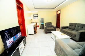 Classic Room, Balcony, City View | Living area - golden leaf apartment (Kigali)