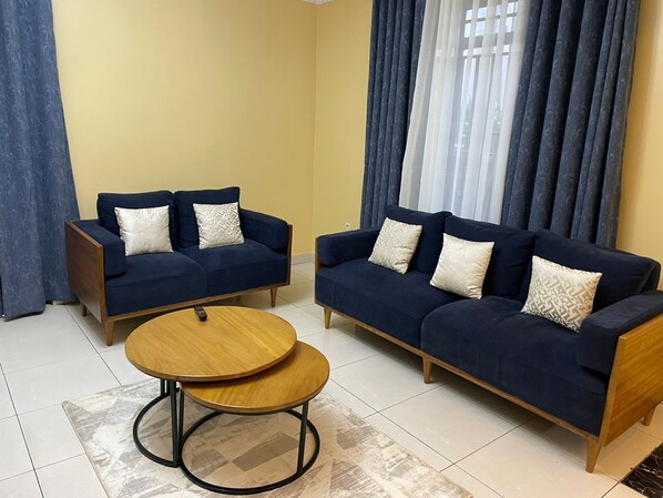 Classic Room, Balcony, City View | Living area - golden leaf apartment (Kigali)