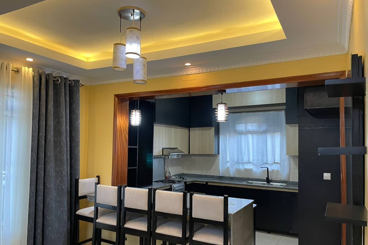 Mini-fridge, oven, cookware/dishes/utensils