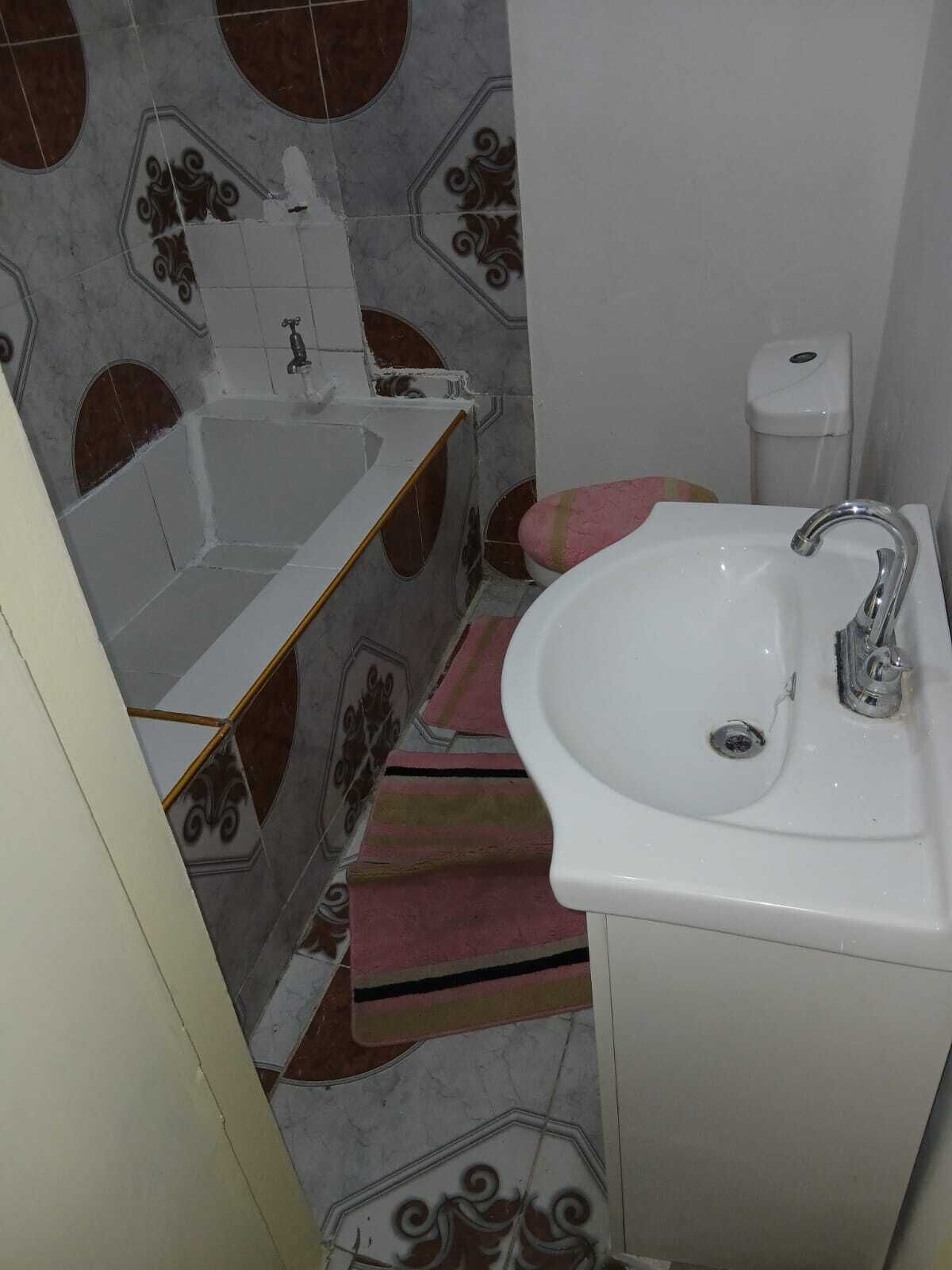 Bidet, towels, soap, toilet paper
