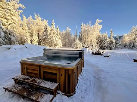 Outdoor spa tub. Birch Bungalow Building @ Alaska Knotty Pine B&B