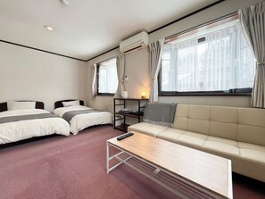 Habitación cuádruple, varias camas | Wifi gratis y ropa de cama