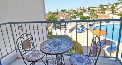 Pegeia Sun - 2 bed house with large communal pool - family friendly