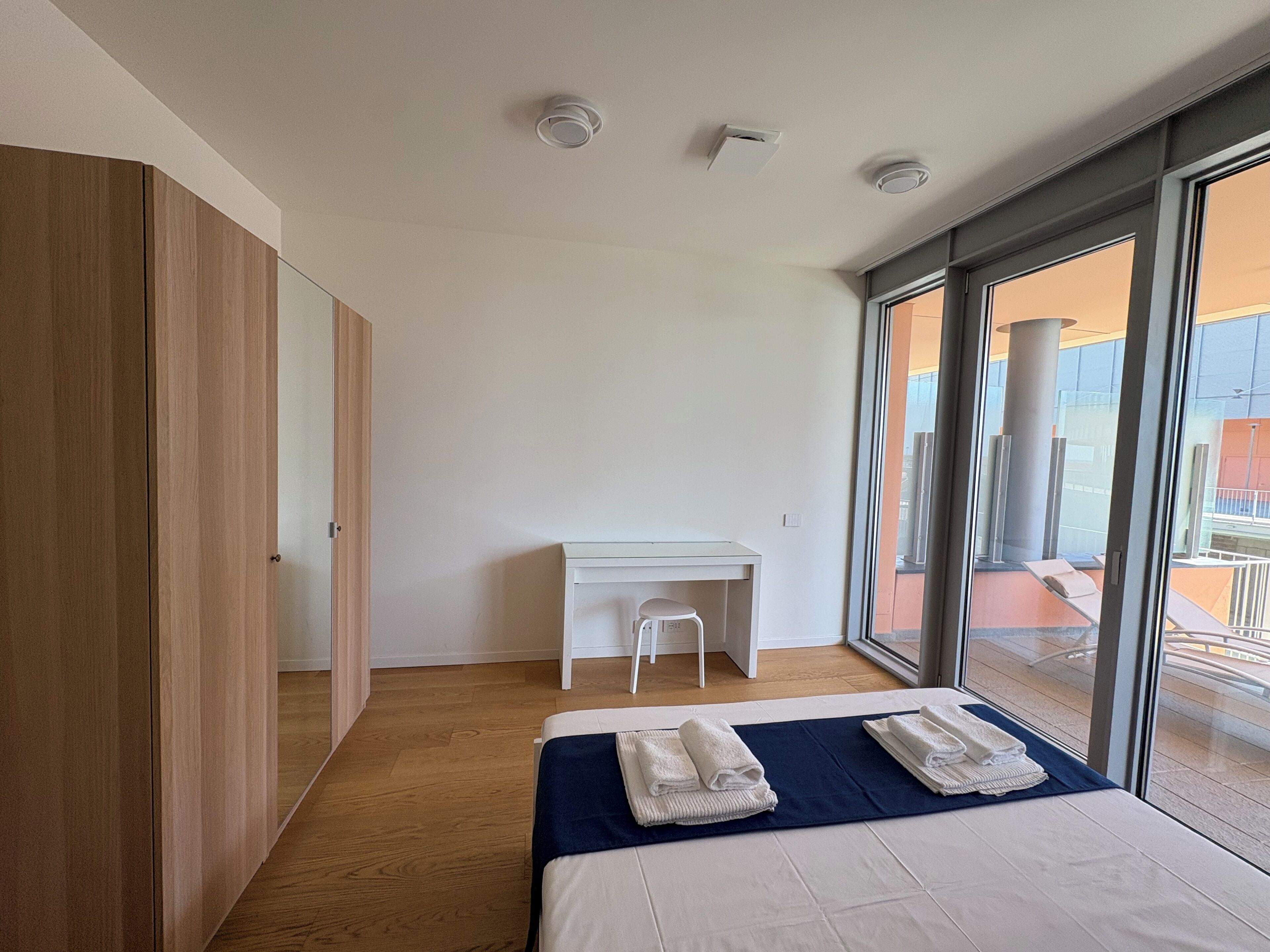 Deluxe Apartment, Sea View | Desk, laptop workspace, blackout drapes, free WiFi
