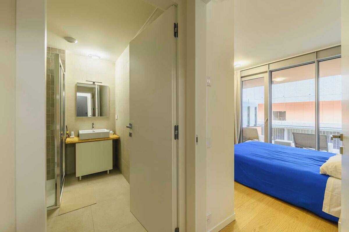 Desk, laptop workspace, blackout curtains, free WiFi