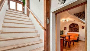 Interior - The Rustico di Zignago, located in the picturesque area of ​​Debbio, offers a unique experience that seems to transport you to another era.This rustic house is the ideal refuge for those seeking tranquility and authenticity.Ground Floor:Living Room w (Zignago)