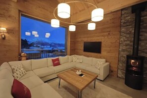 Living area - Chalet Iska - Alpine elegance and warm comfort with breathtaking views (Nendaz)