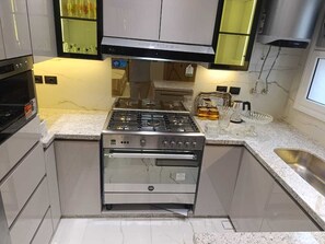 Fridge, microwave, oven, stovetop