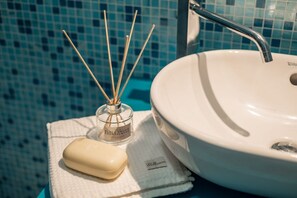 Ducha, bidé, toallas y champú