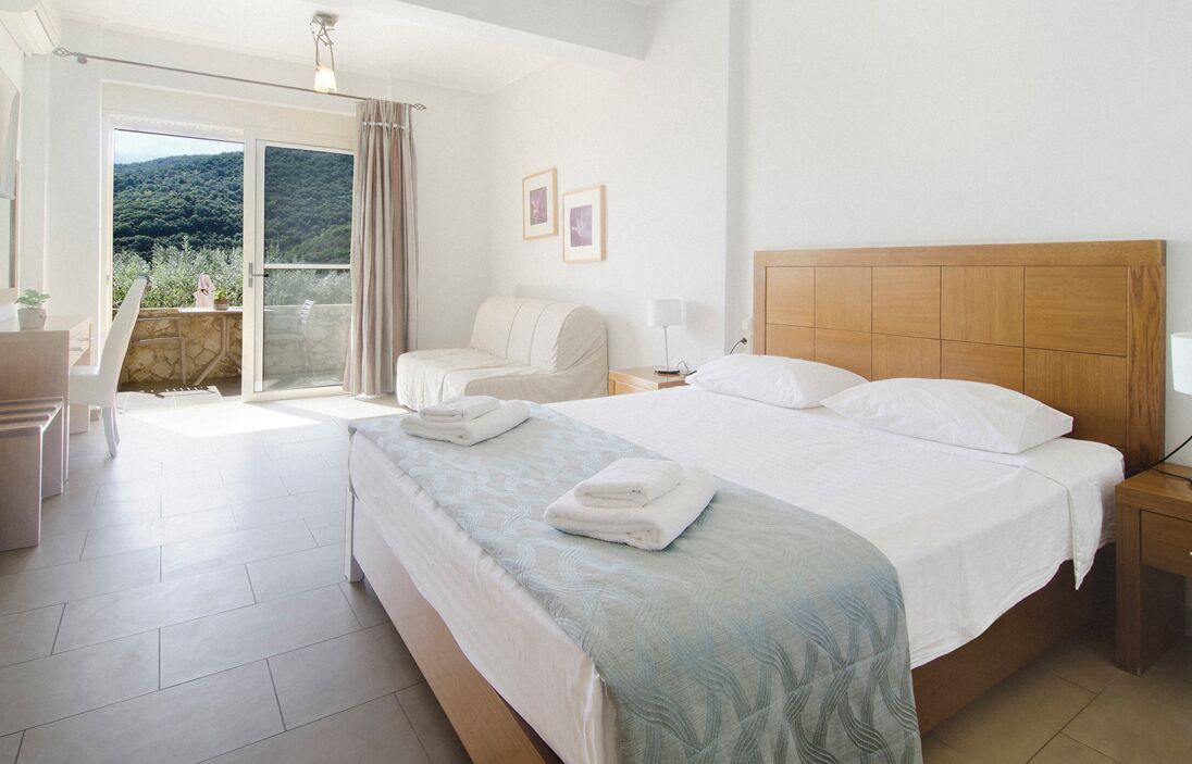 Comfort driepersoonskamer | Woonruimte | Een printer