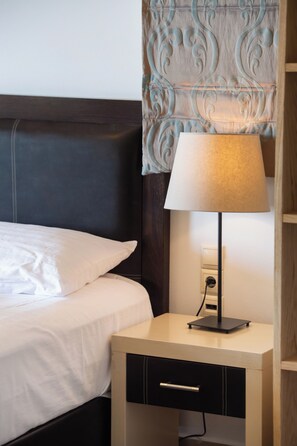 Comfort suite | Een kluis op de kamer, geluiddichte muren, een strijkplank/strijkijzer