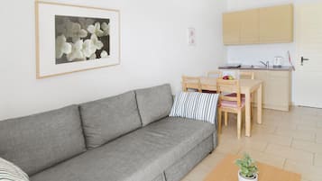 Comfort-Studiosuite, Meerblick | Wohnbereich | Fernseher, Drucker