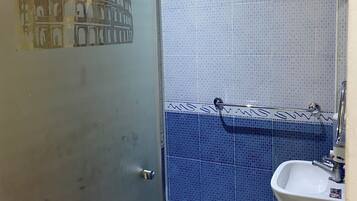 Shower, towels, soap, shampoo