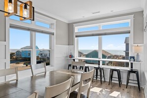 Dining - Discover luxury at 'Tan and No Plan'—a stunning 10-bedroom oceanview retreat in Oak Island! (Oak Island)