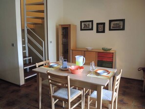 Apartment, 2 Bedrooms, Patio, Garden View | Dining room - Cozy Flat With Shared Pools and Private Garden (San Michele al Tagliamento)