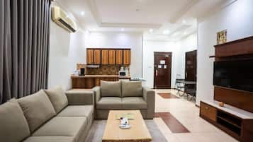 Apartamento superior, 1 habitación | Zona de estar