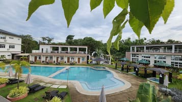 Outdoor pool, open 8:00 AM to 10:00 PM, pool umbrellas