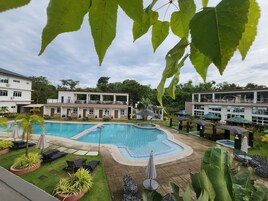 Outdoor pool, open 8:00 AM to 10:00 PM, pool umbrellas
